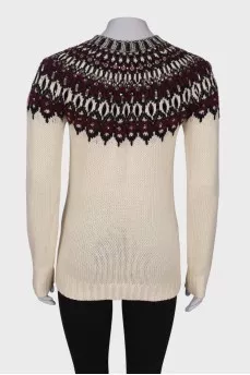 Sweater with pattern and rhinestones