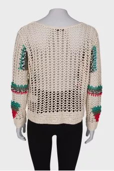 Knitted sweater with tag