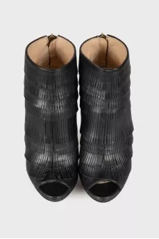 Fringed leather ankle boots