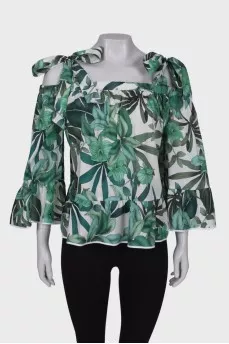 Blouse in green floral print