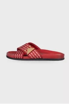 Red flip flops with brand logo