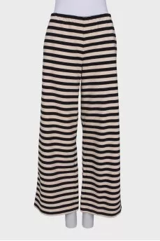 Striped trousers with tag