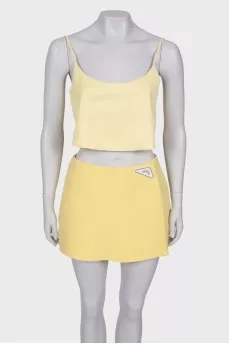 Yellow suit top and shorts