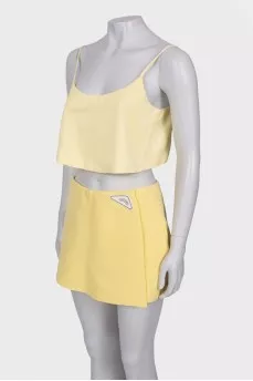 Yellow suit top and shorts