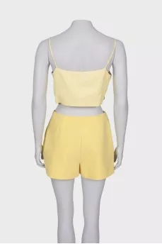 Yellow suit top and shorts