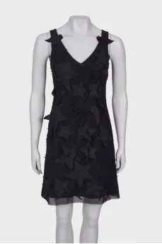 Black dress with star patches