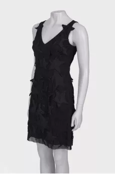 Black dress with star patches