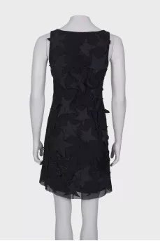 Black dress with star patches