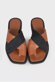 Leather slippers with textiles
