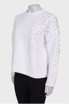 White sweatshirt with appliqué