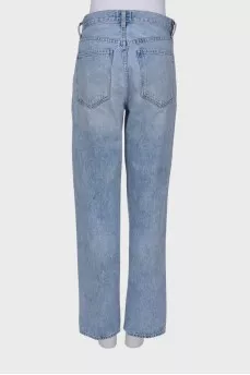 Jeans with asymmetric fastening