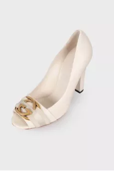 Leather shoes with gold-tone hardware