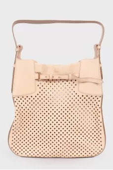 Perforated leather bag
