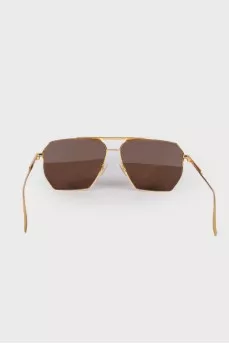 Золотистые солнцезащитные очки