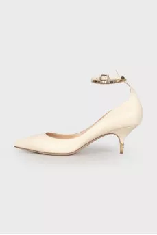 Leather shoes with gold-tone hardware