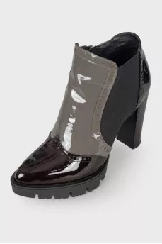 Perforated patent leather ankle boots