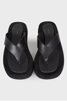 Black leather slippers