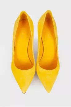 Yellow suede pumps