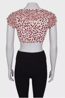 Top with ruffles and print
