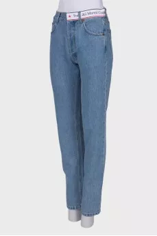 Blue jeans with brand logo