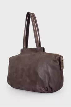 Leather bag with golden logo