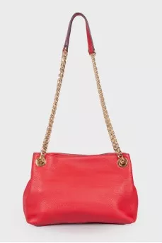 Red bag with gold keychain