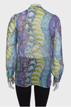 Sheer blouse with ruffles