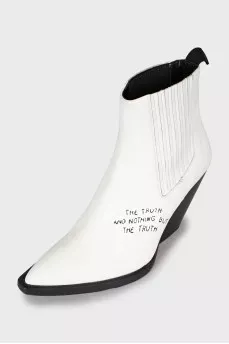 White kozaks decorated with an inscription