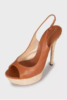 Leather sandals with woven soles