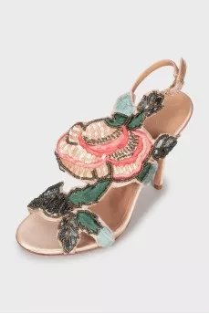 Sandals decorated with beads and sequins