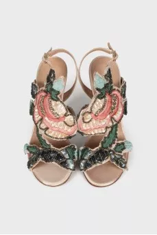 Sandals decorated with embroidery and beads