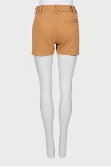 Beige shorts with buttons