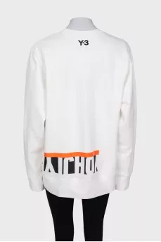 Long sweatshirt with tag