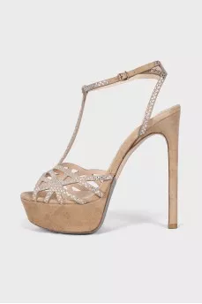 Suede sandals decorated with rhinestones