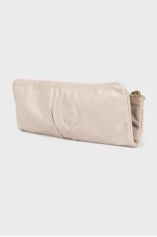 Milk-colored clutch with a zipper