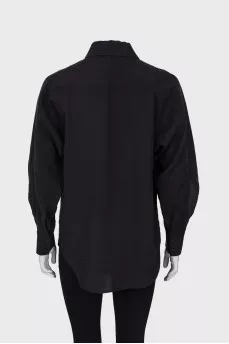 Black shirt with ruffled sleeves
