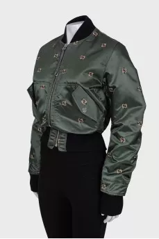 Green bomber jacket with embroidery