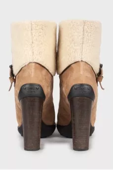 Suede ankle boots with fur heel