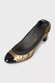 Patent leather shoes with embroidered logo