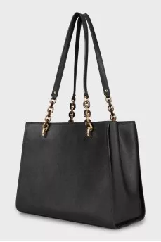 Leather bag with golden keyring
