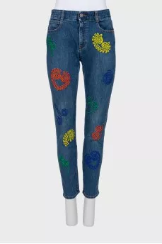 Blue jeans with embroidered print