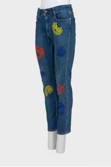 Blue jeans with embroidered print