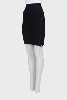 Black skirt decorated on the sides