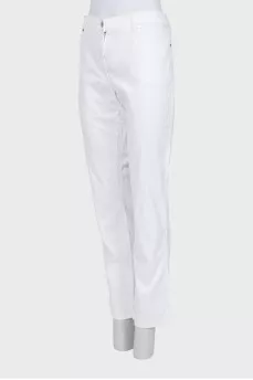 White jeans with gold hardware