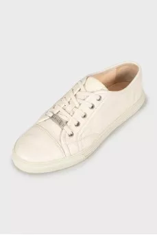 Leather sneakers with metal logo