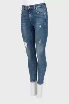 Skinny jeans with ripped effect