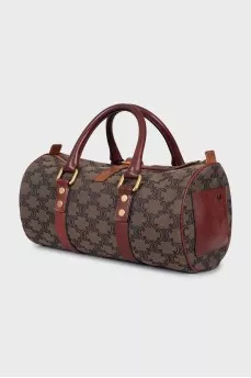 Cylindrical bag in signature print