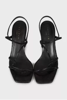 Black sandals with snakeskin embossing