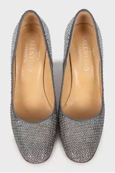 Textile shoes decorated with rhinestones