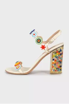 Leather sandals with appliqué